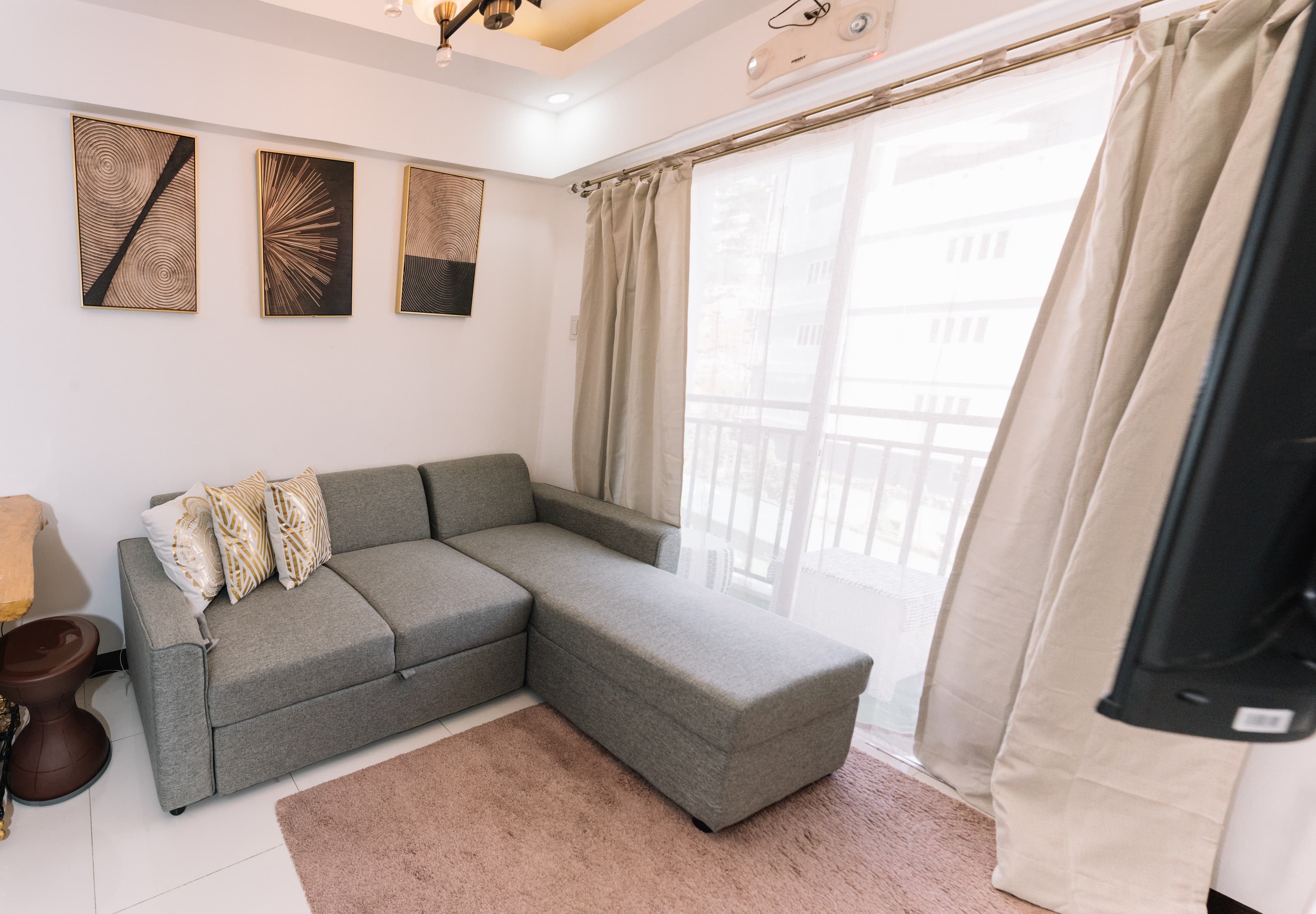 Living room with sofa and Smart TV